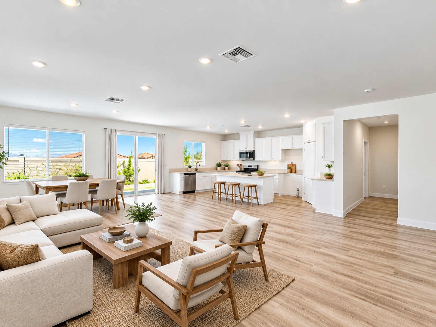 Bright open-plan living room, dining area and kitchen